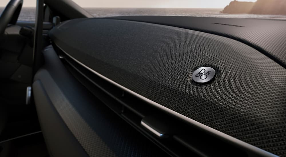 A close up shows the speaker on the black dash of a 2022 Ford Mustang Mach-E.