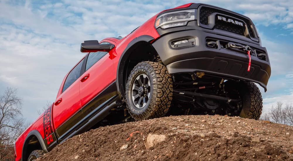A red 2022 Ram 2500 Power Wagon is shown from the front at a low angle.