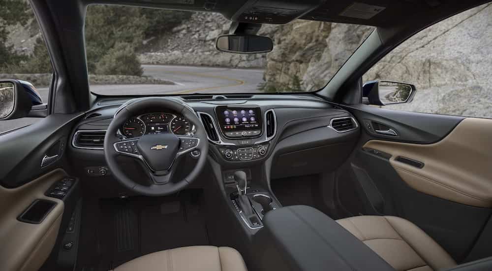 The interior of a 2023 Chevy Equinox Premier is shown from the drivers seat.