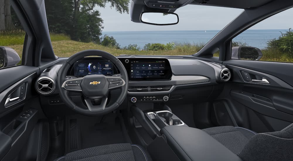 The interior of a 2024 Chevy Equinox EV is shown from the drivers seat.