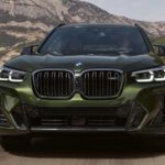 A green 2023 BMW X3 is shown from the front after leaving a dealer that had a BMW X3 for sale.