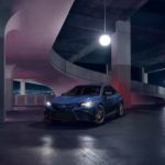 A blue 2023 Toyota Camry Nightshade is shown from the front at an angle in a parking garage after leaving a dealer that had a Toyota Camry for sale.