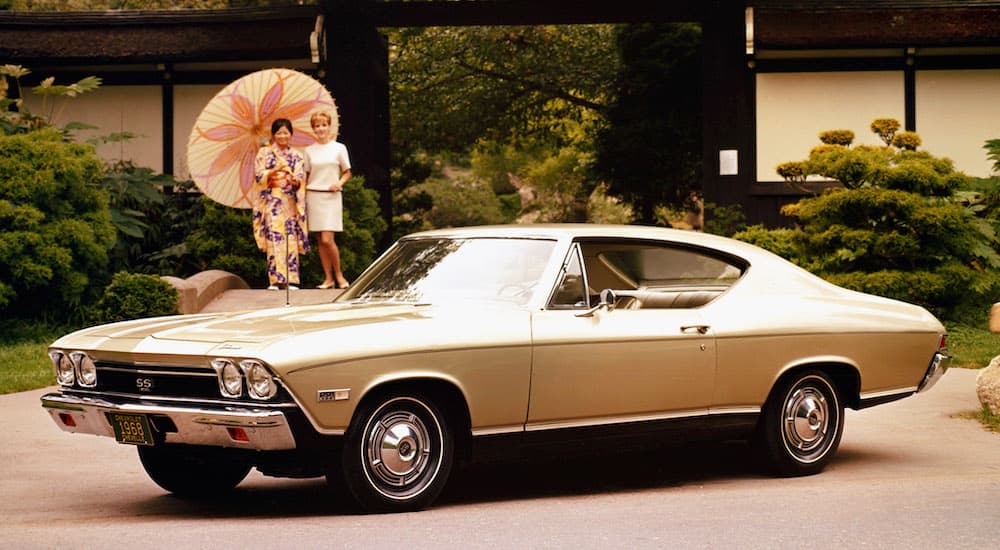 A gold 1968 Chevy Chevelle SS is shown from the side.