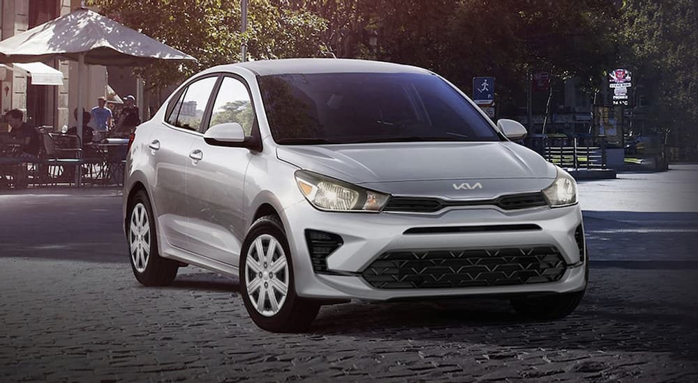 A popular Kia Rio for sale, a silver 2023 Kia Rio is shown from the front.