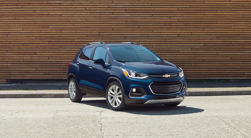 A blue 2018 Chevy Trax is shown from the front at an angle after leaving a used Chevy Trax dealer.