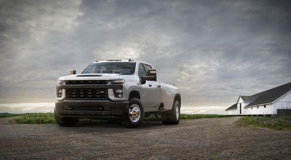 A white 2020 Chevy Silverado 3500 HD Work Truck is shown from the front at an angle.