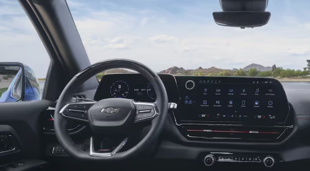 The black interior and dash of a 2024 Chevy Silverado EV is shown.