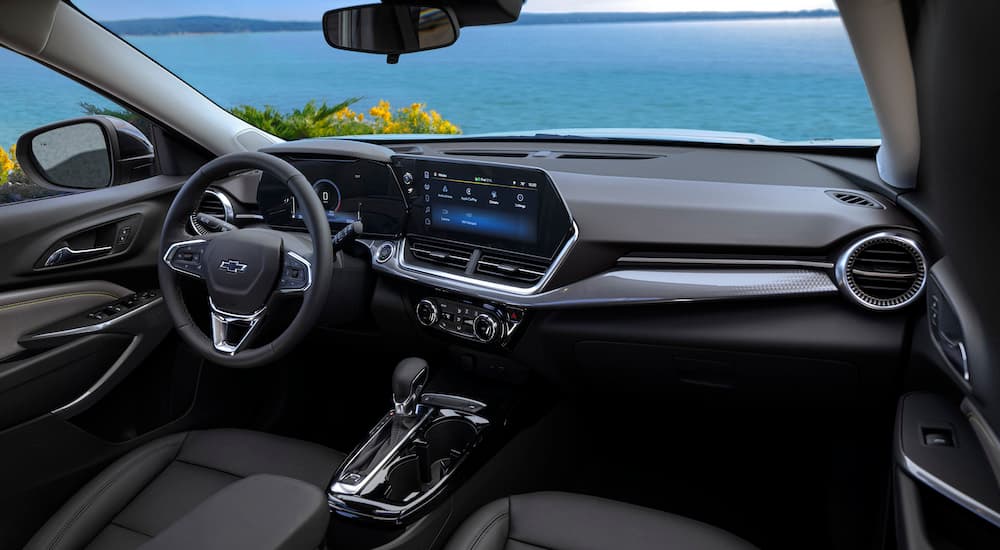 The interior of a 2024 Chevy Trax is shown from the passenger seat.