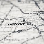 A map shows the city of Detroit near many used car lots in Jackson, MI.