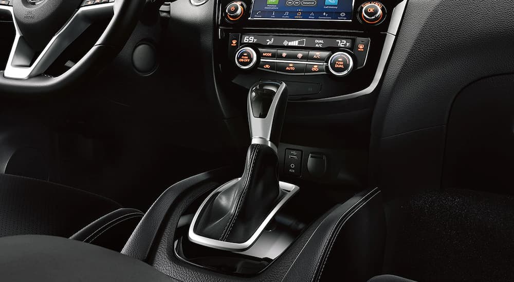 A close up of the shifter in a 2021 used Nissan Qashqai for sale is shown.