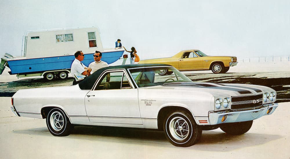 A white 1970 Chevy El Camino SS1 is shown after leaving a used Chevy truck dealer.