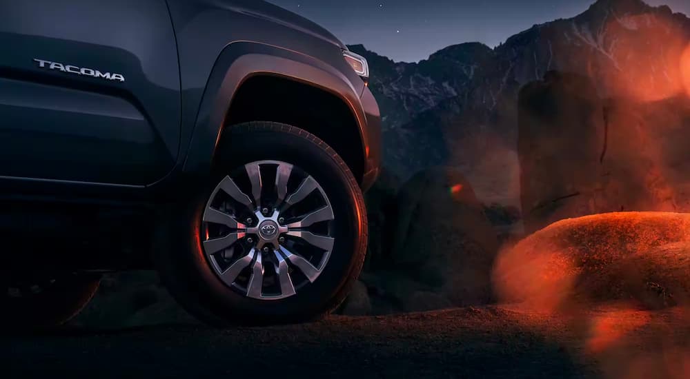 A close up shows the wheel on a 2023 Toyota Tacoma SR5.