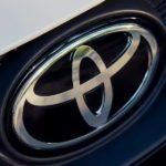 A close up shows the Toyota badge.