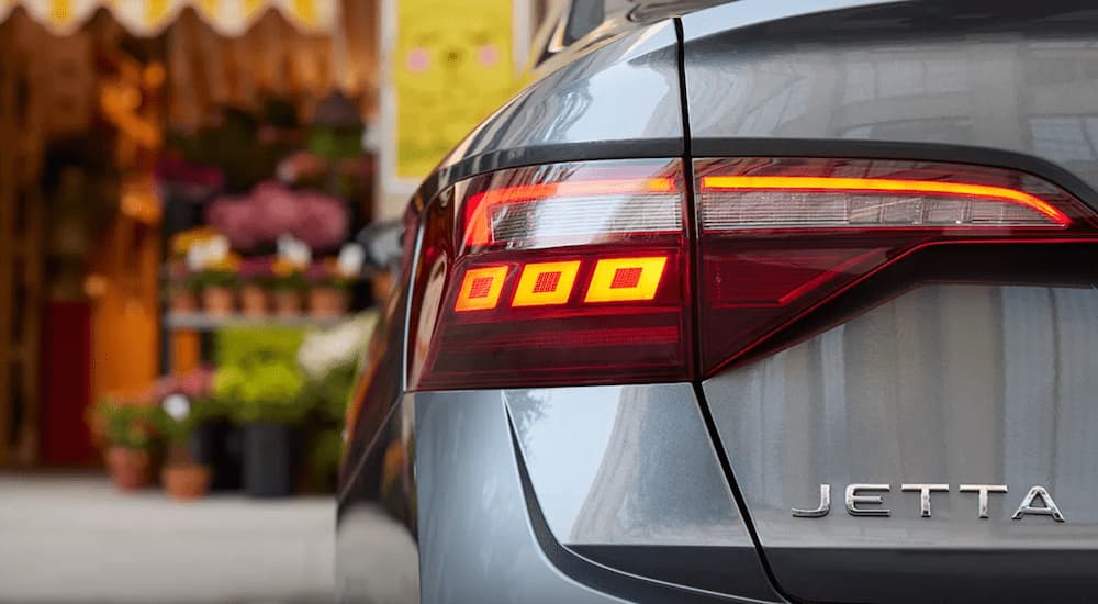 The rear brakelight on a silver 2023 Volkswagen Jetta is shown.