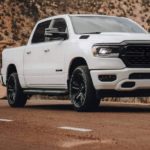 A white 2022 Ram 1500 is shown from the front at an angle.