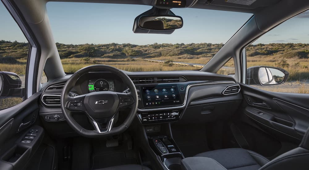 The interior of a 2023 Chevy Bolt EV is shown from the driver's seat.