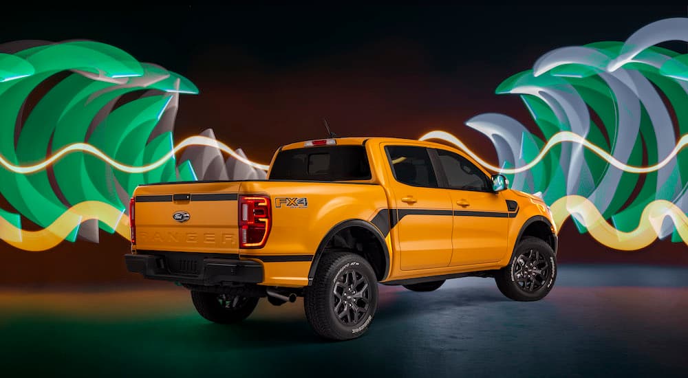 A yellow 2023 Ford Ranger Splash is shown from the rear at an angle.