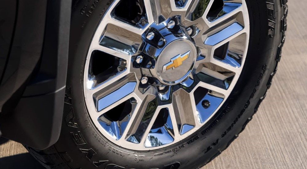 A close up shows the wheel on a 2024 Chevy Silverado 2500HD.