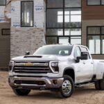 A white 2024 Chevy Silverado 3500 HD LTZ is shown from the front at an angle.