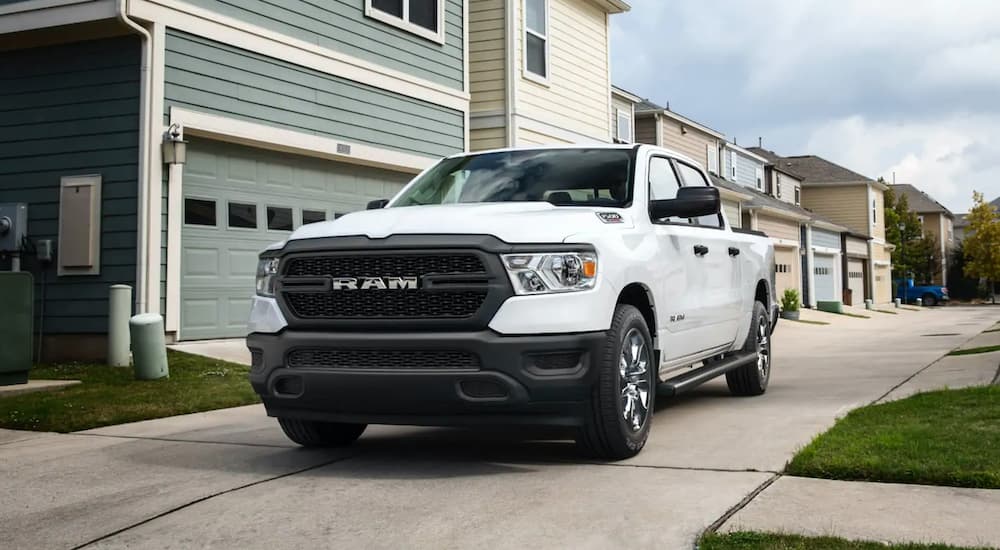 A white 2022 Ram 1500 Tradesman is shown from the front at an angle.