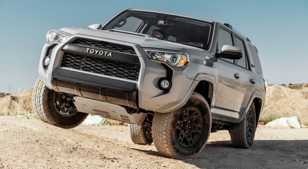 A grey 2017 Toyota 4Runner is shown from the front after leaving a dealer that has used cars for sale.