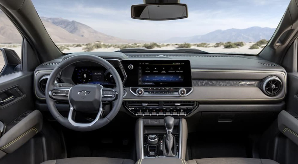 The interior and dash of a 2023 Chevy Colorado is shown.