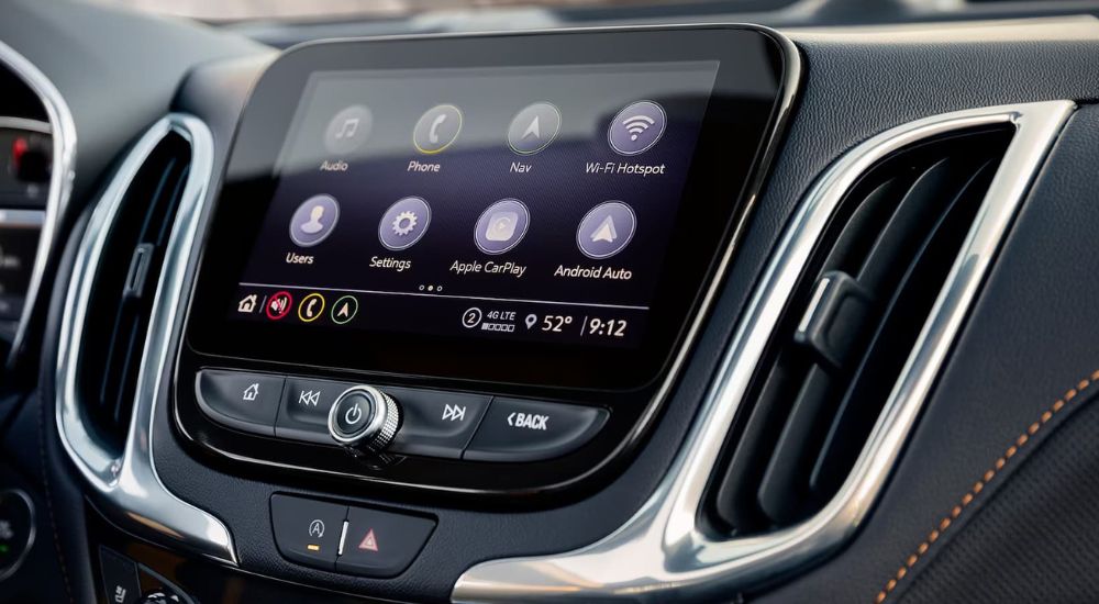 The 2023 Chevy Equinox infotainment screen is shown.