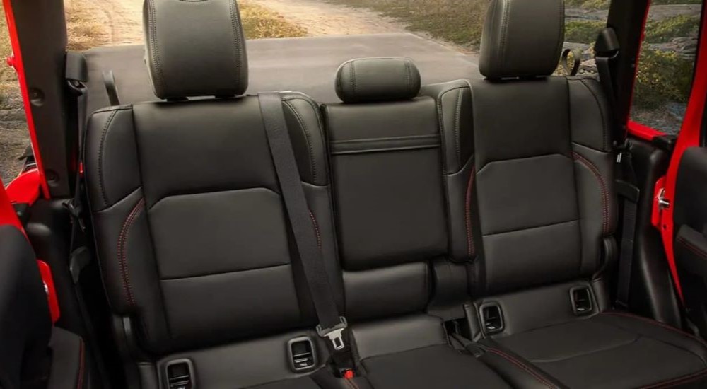 The rear leather seats are shown in a 2023 Jeep Gladiator.