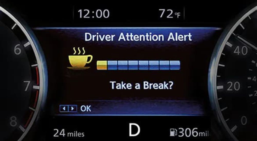 The Nissan Driver Attention Alert feature display is shown.