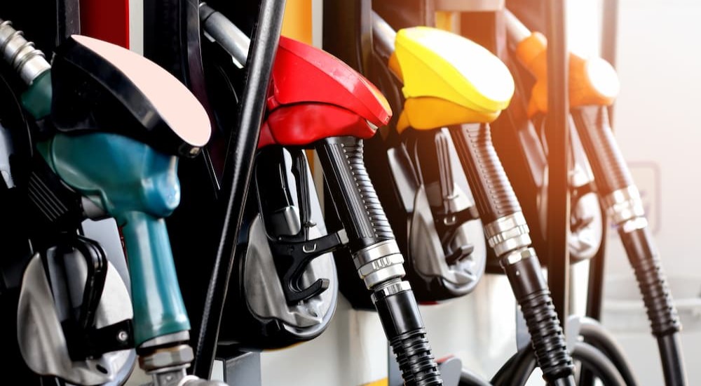 Several fuel pumps of assorted colors are shown.