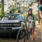 A white 2023 Ford Bronco is shown parked off-road after winning a 2023 Ford Bronco Sport vs 2023 Honda HR-V comparison.