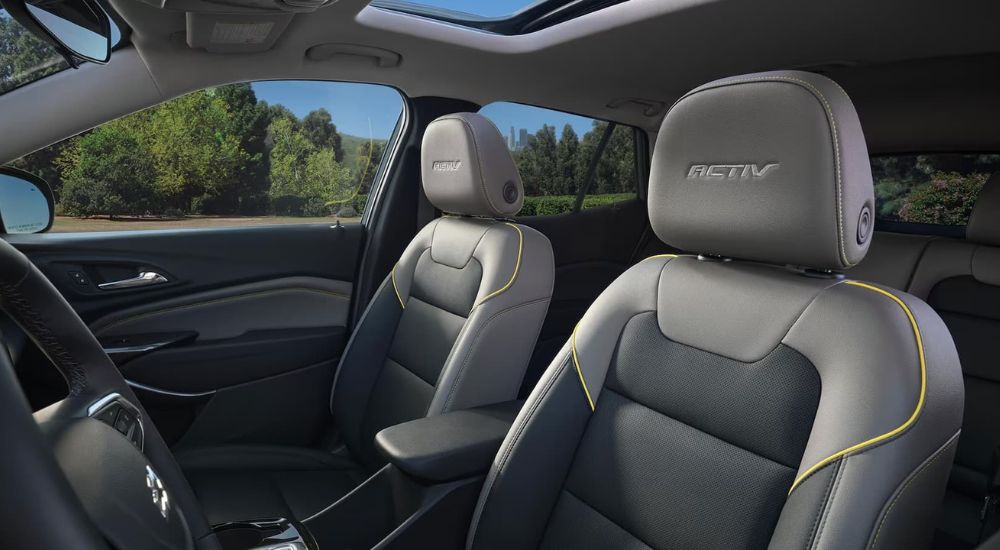 The black interior with yellow accents of the 2024 Chevy Trax ACTIV is shown.