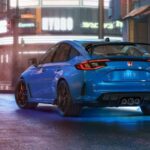 A blue 2023 Honda Civic Type-R is shown leaving a Honda dealer.