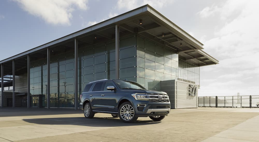 A blue 2022 Ford Expedition Platinum is shown from the front at an angle.