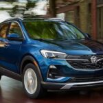 A blue 2023 Buick Encore GX is shown driving after winning a 2023 Buick Encore GX vs 2023 Honda HR-V comparison.