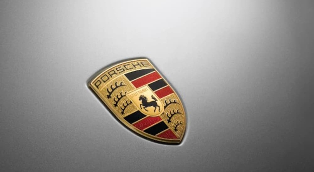 A Porsche logo is shown.