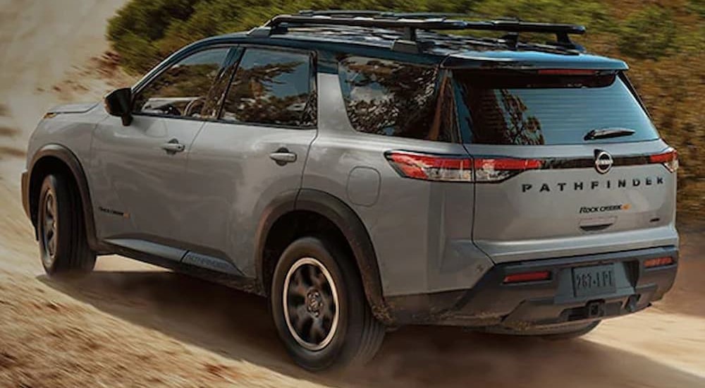 A gray 2023 Nissan Pathfinder Rock Creek is shown off-roading.