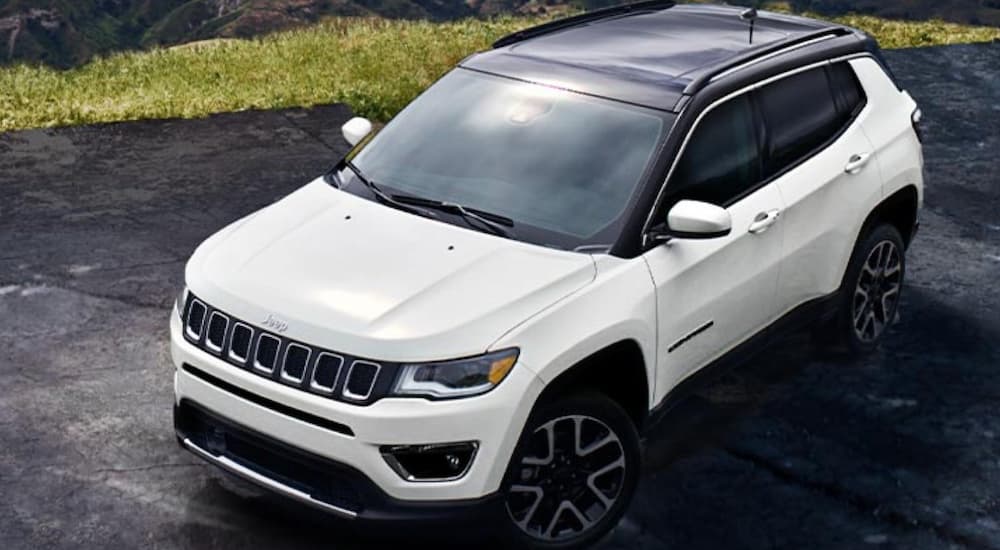 A white 2020 Jeep Compass is shown from a high angle.