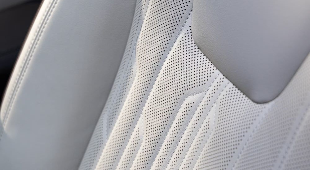A close up shows the white leather seat in a 2024 Buick Encore GX.