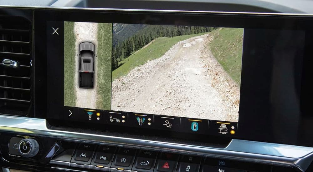 Two views on a back up camera are shown in a 2023 Chevy Silverado 1500.