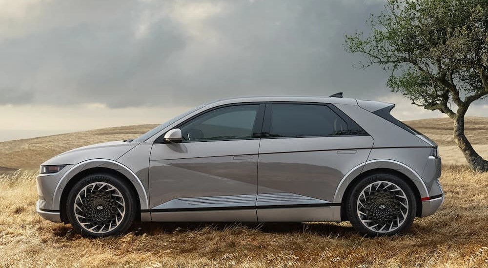 A gray 2022 Hyundai Ioniq 5 is shown parked off-road.