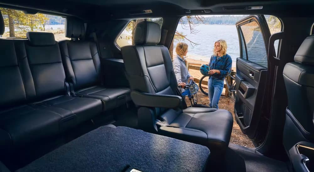 The black rear interior of a 2023 Toyota Sequoia is shown.