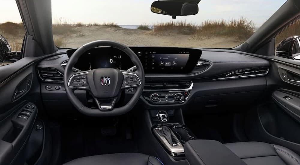 The black interior and dash of a 2024 Buick Envista is shown.