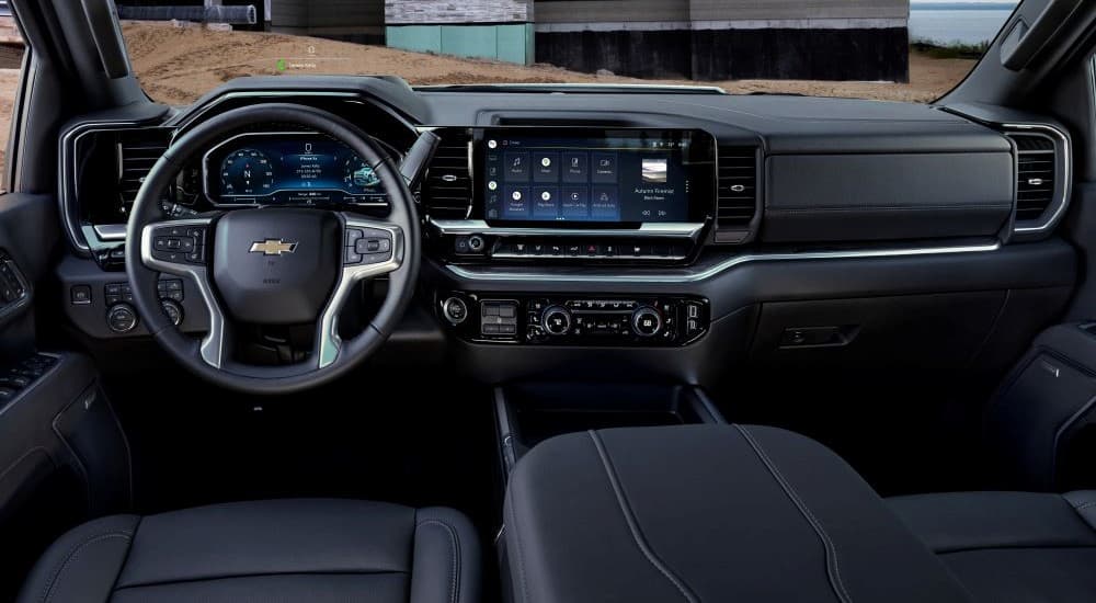 The black interior and dash of a 2024 Chevy Silverado 3500Hd LTZ is shown.