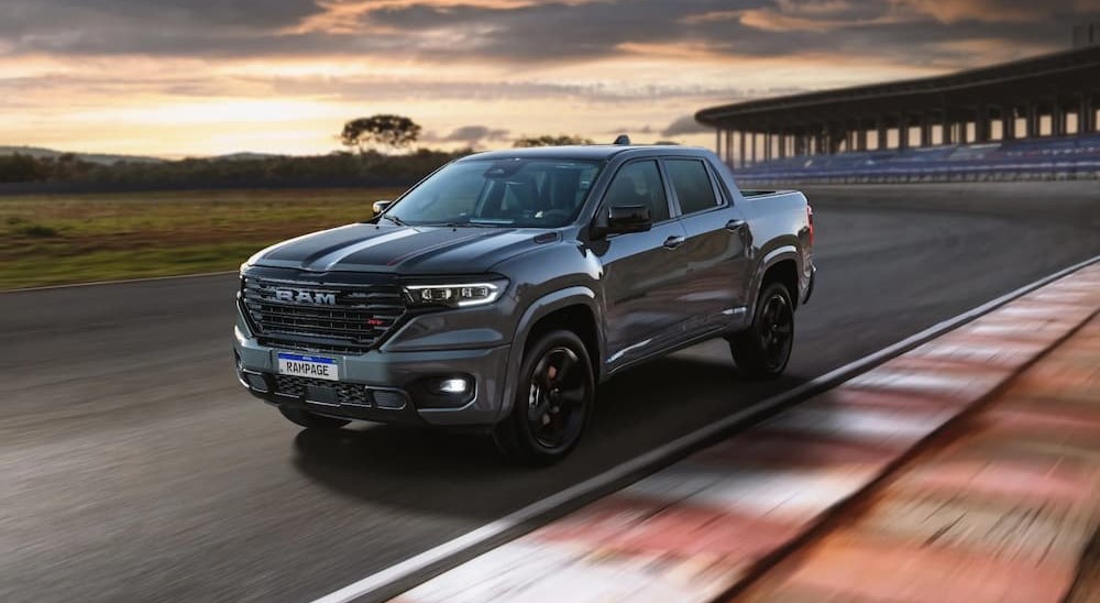 A 2024 Ram Rampage R/T is shown driving on a track after visiting a Ram dealer.