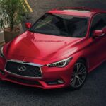 After discussing "Will Infiniti survive?" A red 2023 Infiniti Q60 is shown parked near a restaurant.