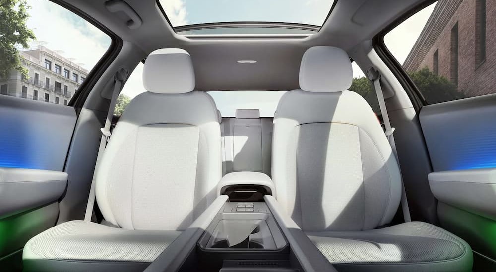 The white interior of a 2023 Hyundai IONIQ 6 is shown.