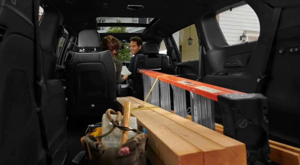 The black rear cargo space in a 2023 Chrysler Pacifica is shown.