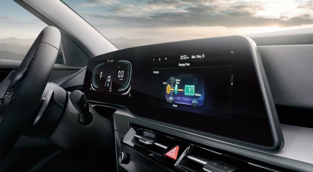 The black dash of a 2023 Kia Niro Plug-in Hybrid is shown.