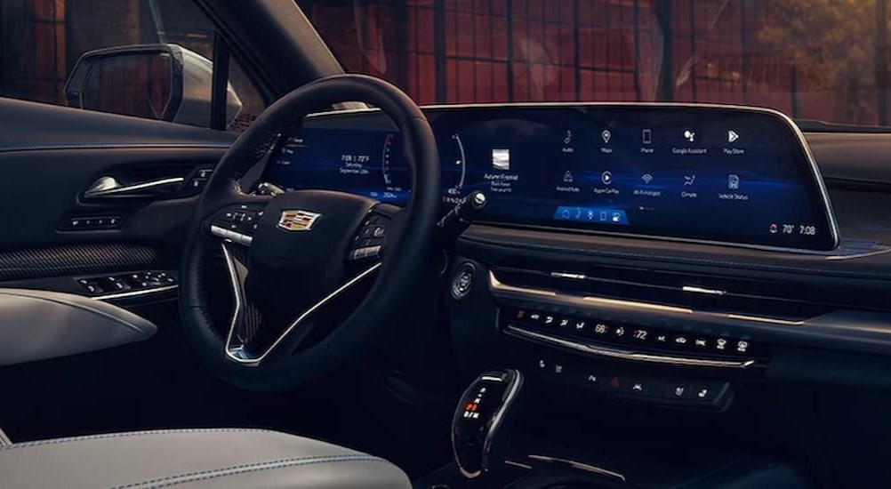 The black and gray interior and dash of a 2024 Cadillac XT4 is shown.
